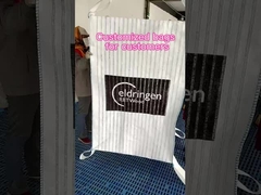 Tas besar dengan jaring di empat sisi